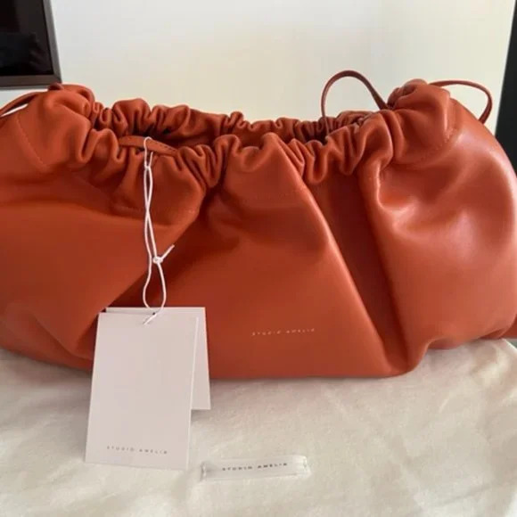 STUDIO AMELIA Maxi Drawstring Ruched Lambskin Clutch Bag